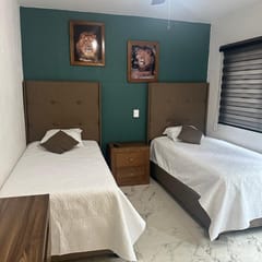 Habitación a 1 cuadra de la gran plaza